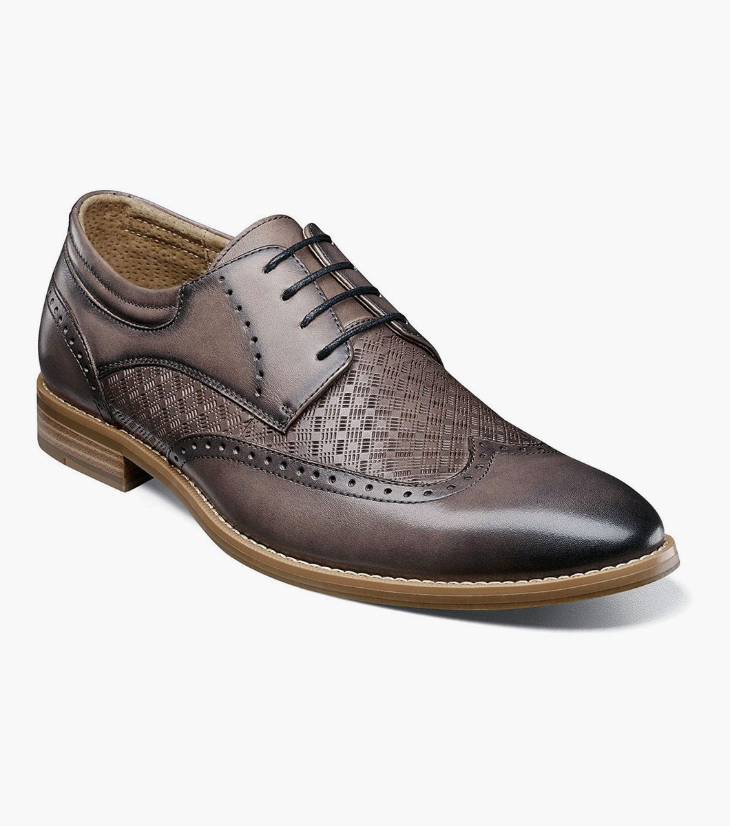 black and grey wingtip shoes
