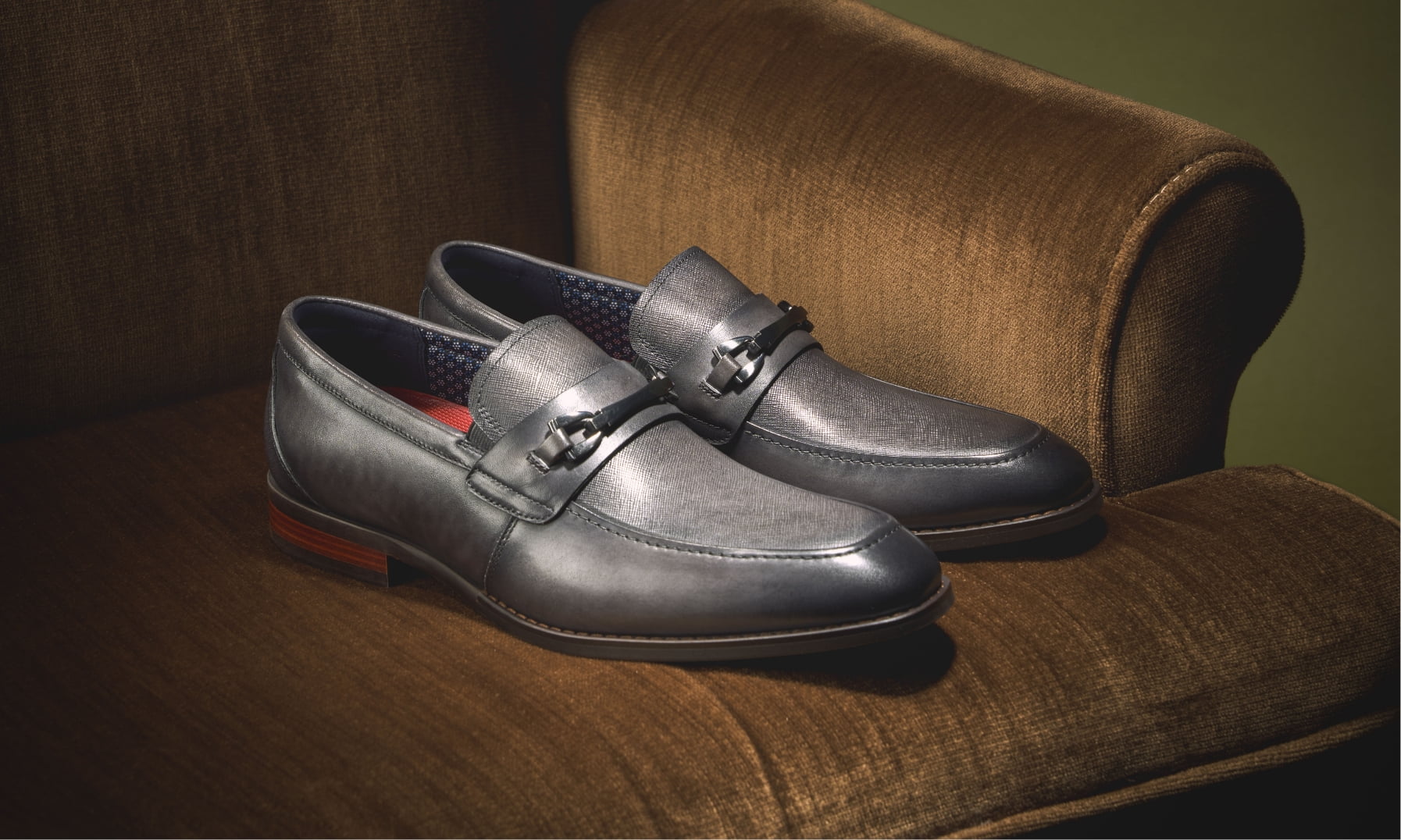 Click to shop Stacy Adams dress styles. Image features the Kaylor slip on in grey.