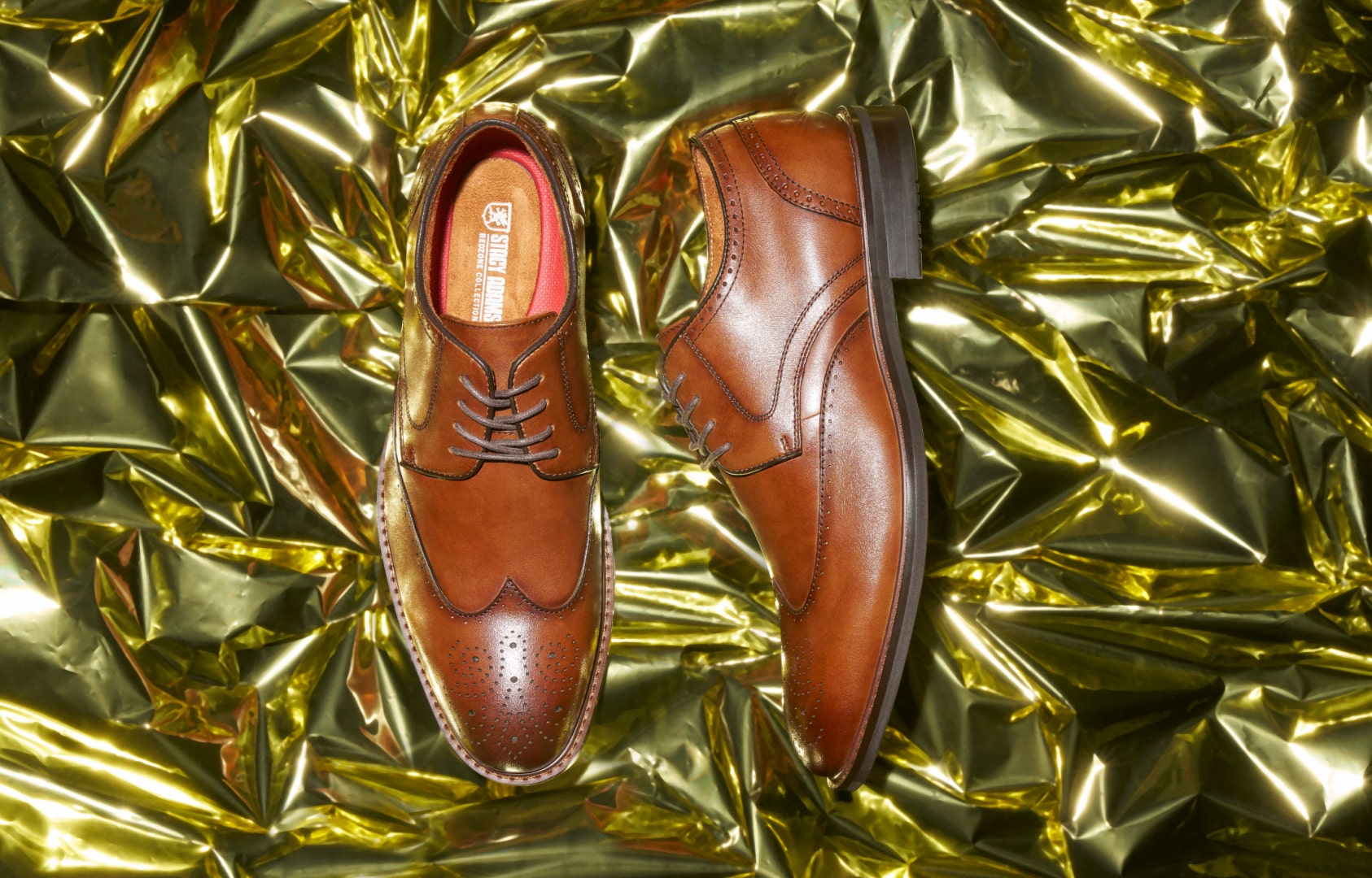 Shop Stacy Adams dress styles featuring the Bennett wingtip in cognac on gold foil.