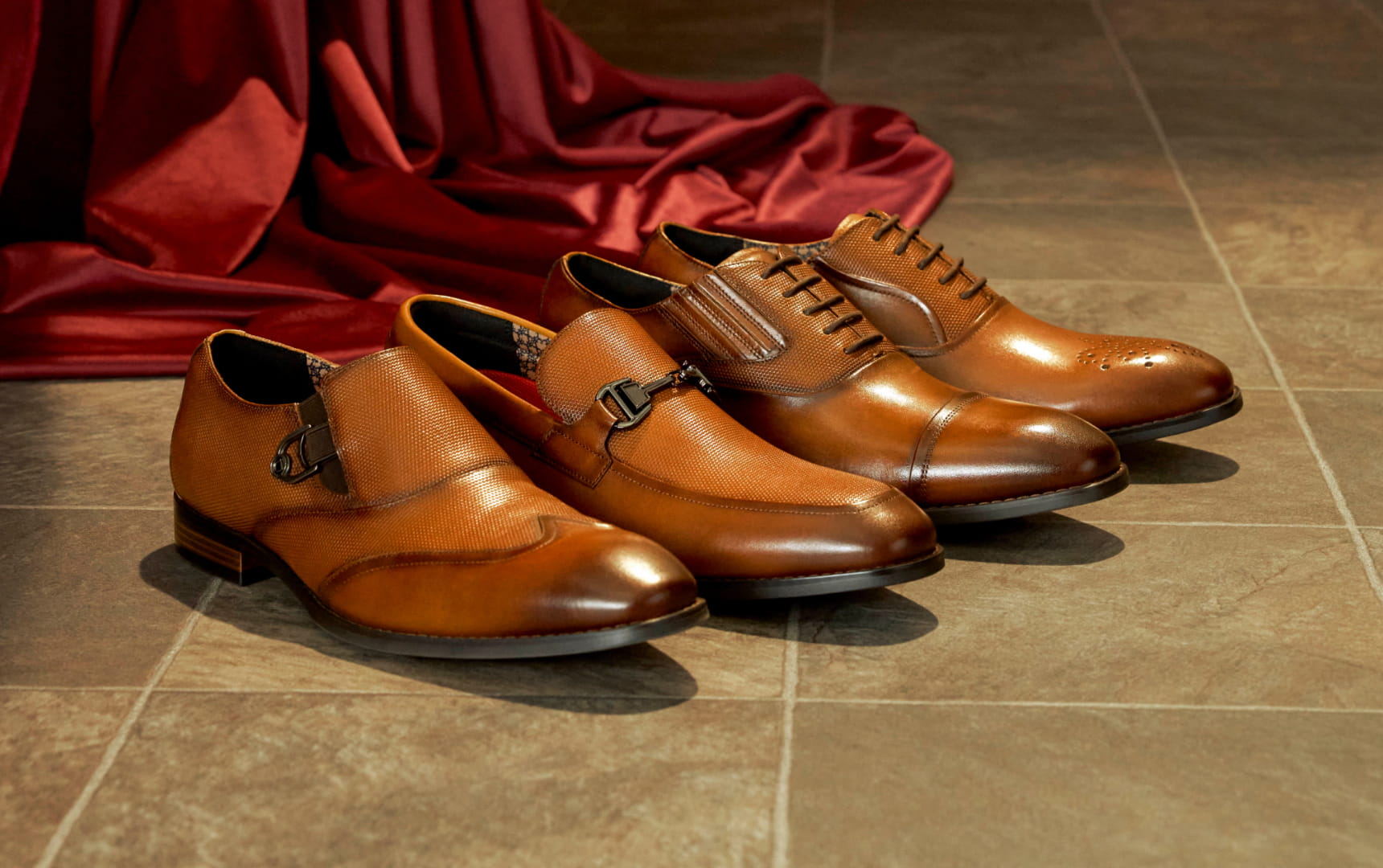 Shop the new Stacy Adams L Series featuring the cognac colorways on a tile floor.