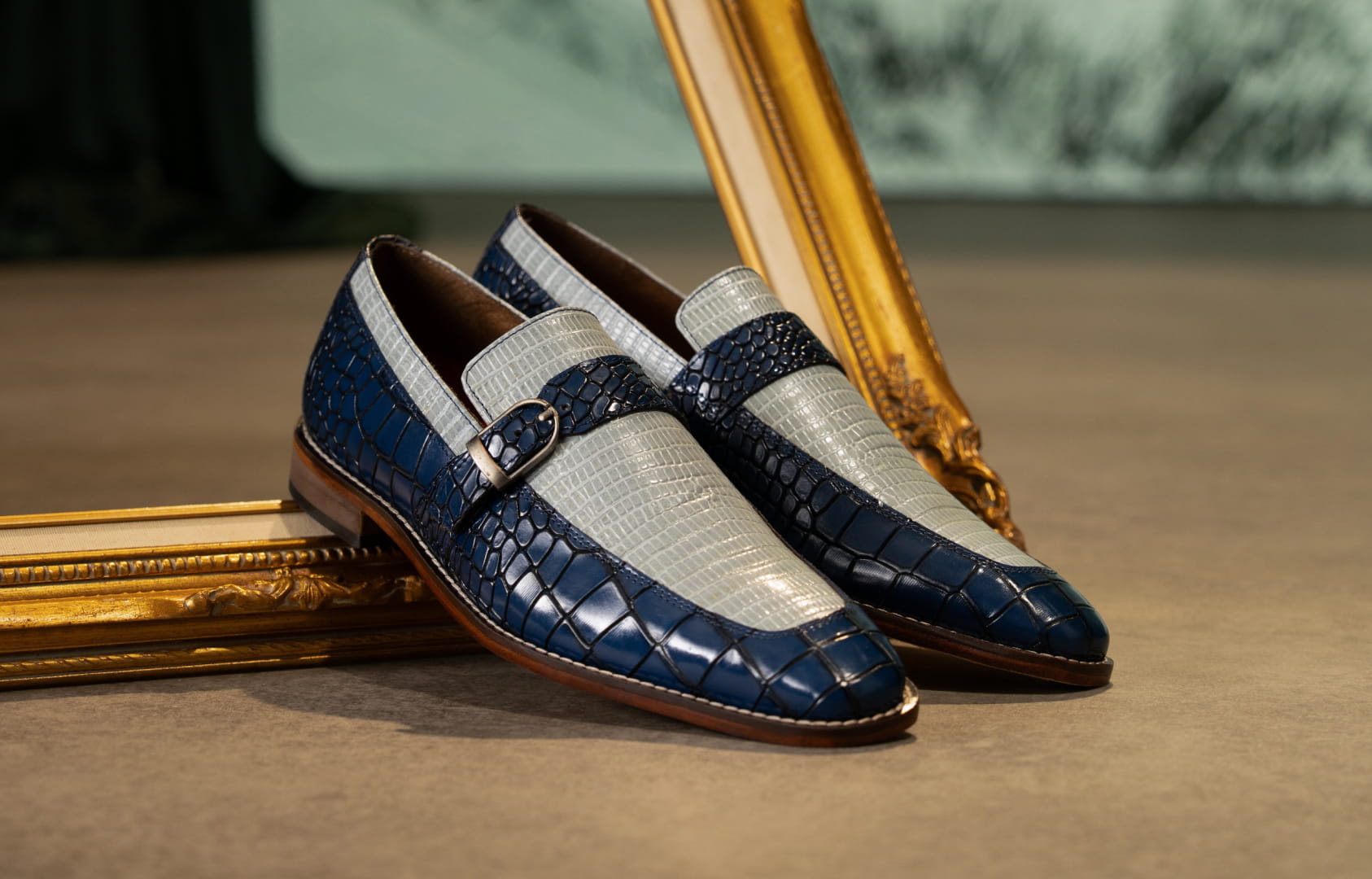 Shop Stacy Adams fashion styles featuring the Rubiano loafer in blue multi next to an empty gold frame.