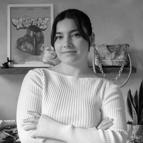 A black and white portrait image of customizer artist Stella Stockbridge