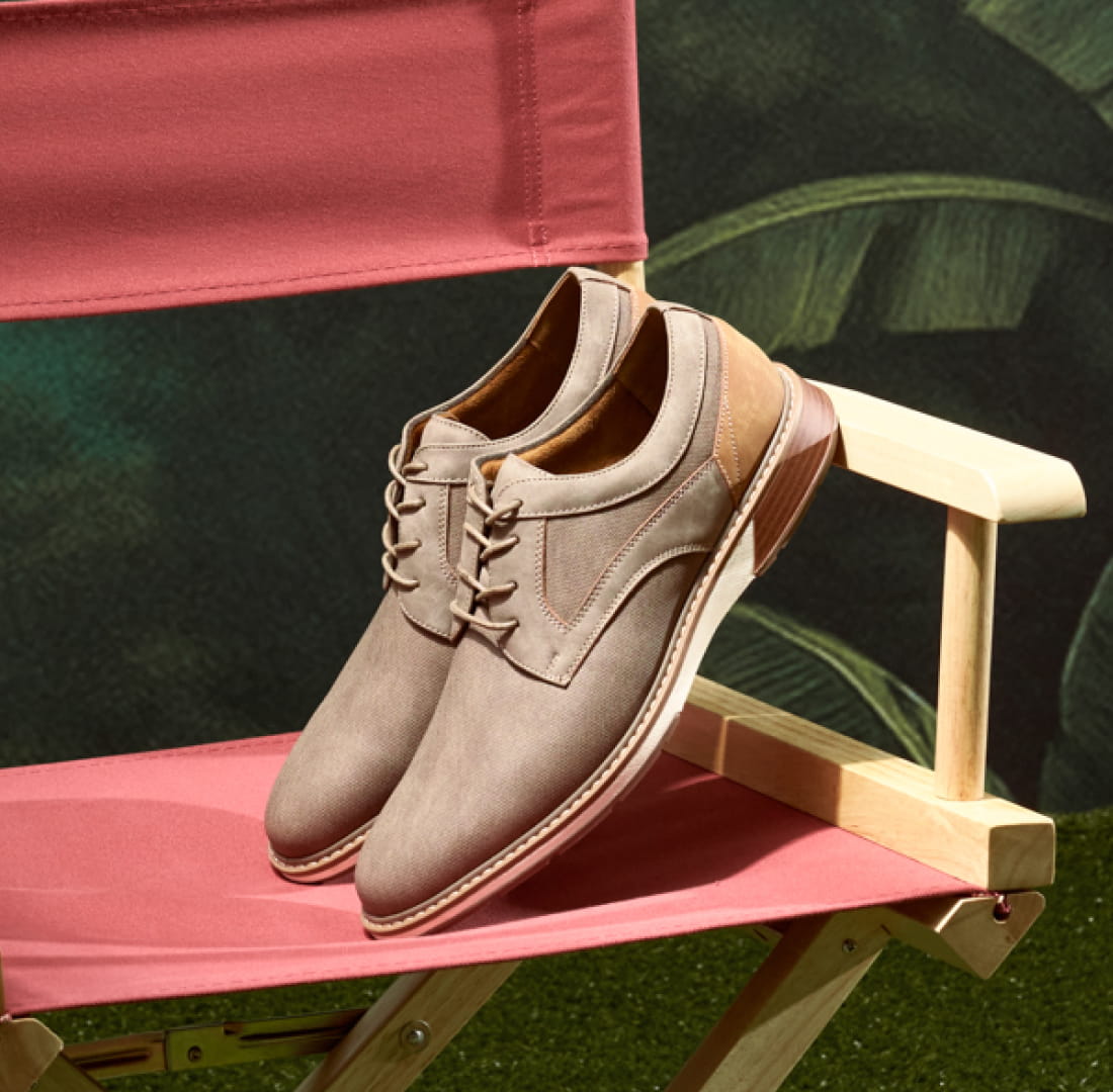 Shop Stacy Adams hybrids featuring an oxford on a red cloth folding chair.