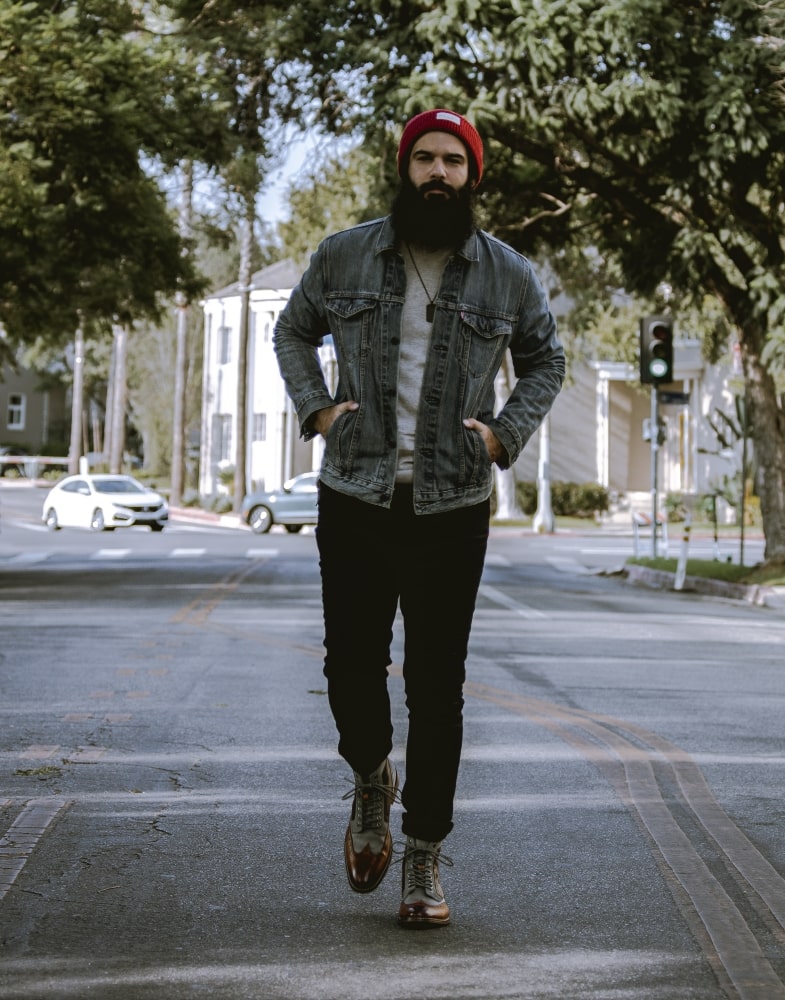 Image of social media influencer Anthony Mastracci walking down the street in our Finnegan Wingtip Lace Up Boot.