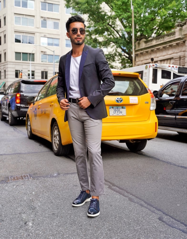 Image of social media influencer Mark Bay wearing the Hawkins Cap Toe Lace Up in Indigo in NYC.