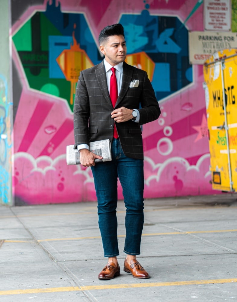 Image of social media influencer Diego Leon wearing the Quinby Moc Toe Tassel Slip On in Tan while out and about in New York.