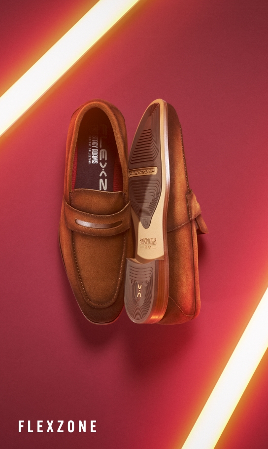  Image features the Burke penny loafer in cognac. 
