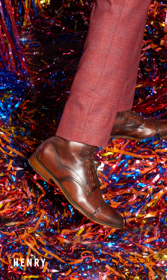 Men's Dress Shoes category. Image features the Henry boot in cognac. 