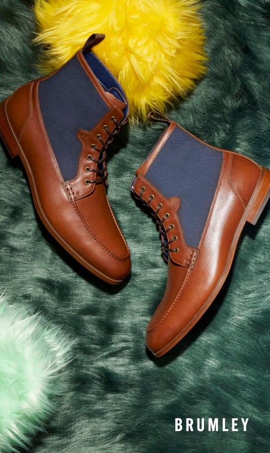 Men's Boots category. Image features the Brumley Boot in Tan Multi surrounded by balls of fabric.