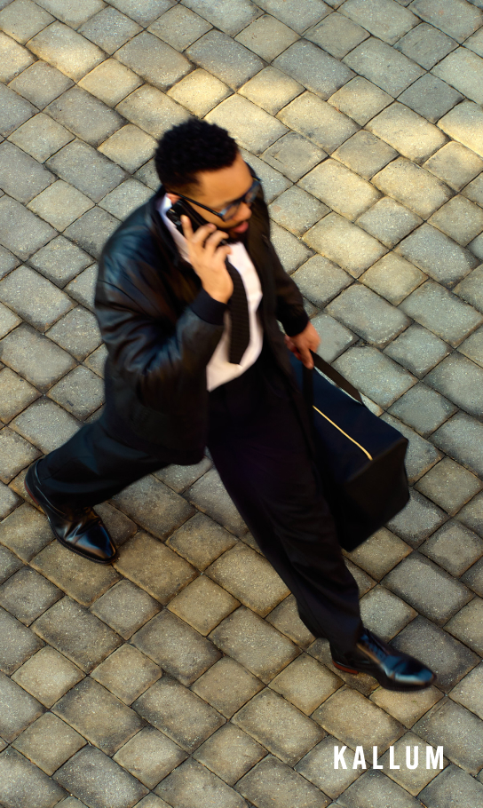 Career Ready Styles Image features a man walking in the Kallum cap toe oxford in black.