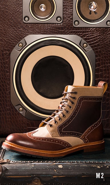 M2 Collection category. The featured product is the M2 Wingtip Lace Up Boot in Brown Multi.