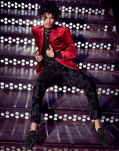 Image of a feature from the September 2018 issue of Esquire Magazine. The featured image is a model sitting on a set of steps wearing the Swank Sequined Slip On in Black.