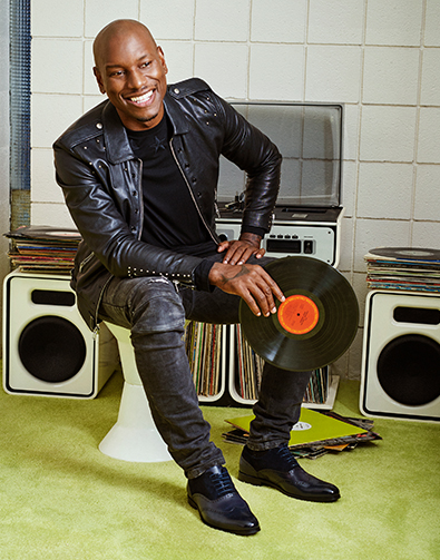 Image of a feature from the October 2016 issue of GQ Magazine. The featured product is the Stanbury Wingtip Oxford in Navy which is worn by actor Tyrese Gibson.