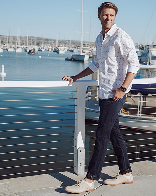 Image of social media influencer Drew Mellon wearing the Westby Plain Toe Oxford in Sandstone in Newport Beach, California.