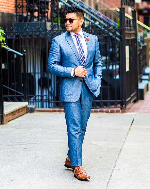 Image of social media influencer Diego Leon wearing the Madison Cap Toe Double Monk Strap in Oak while looking off into the distance.